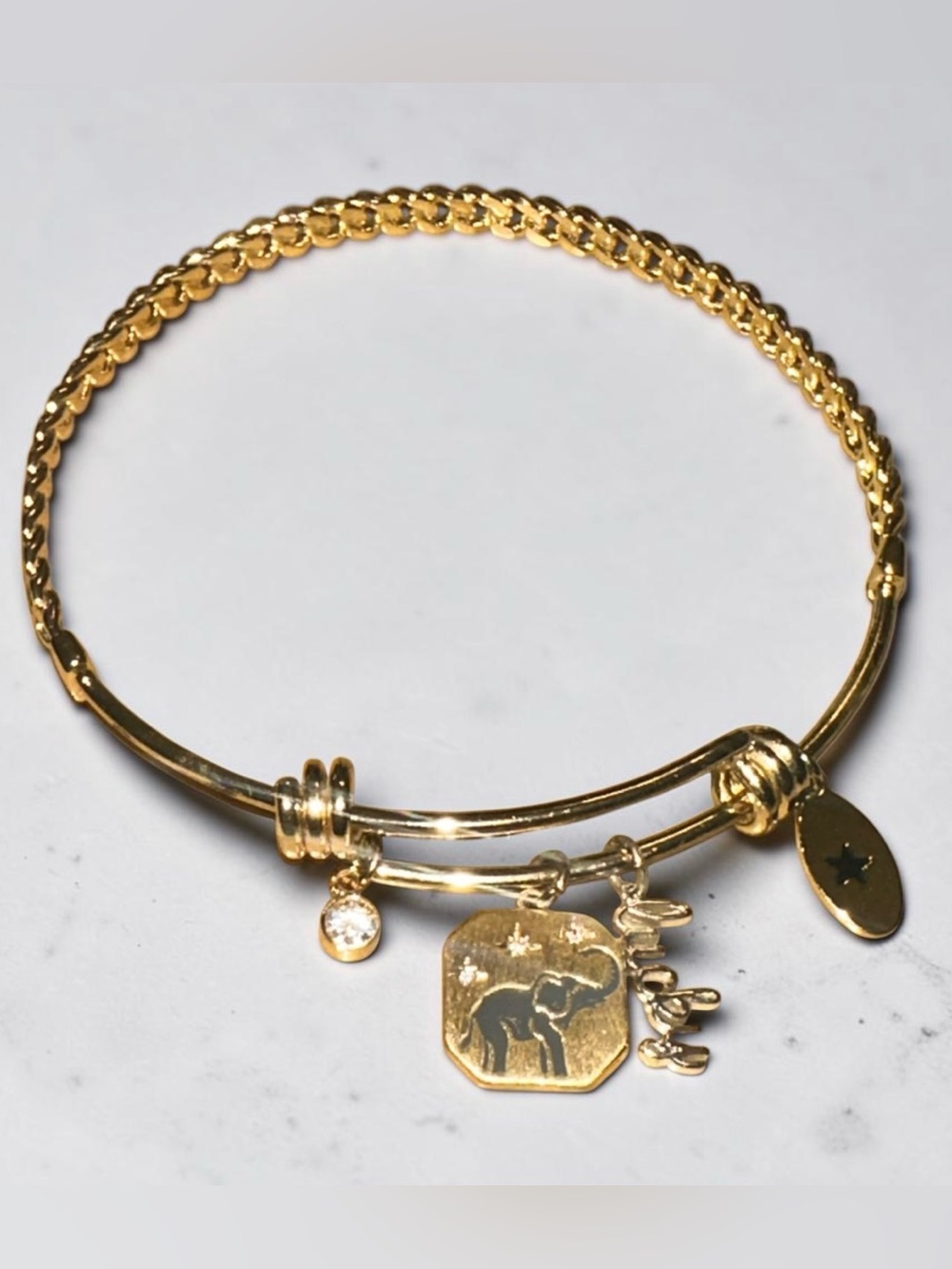 Unwritten Gold tone Elephant Charm Bangle Bracelet